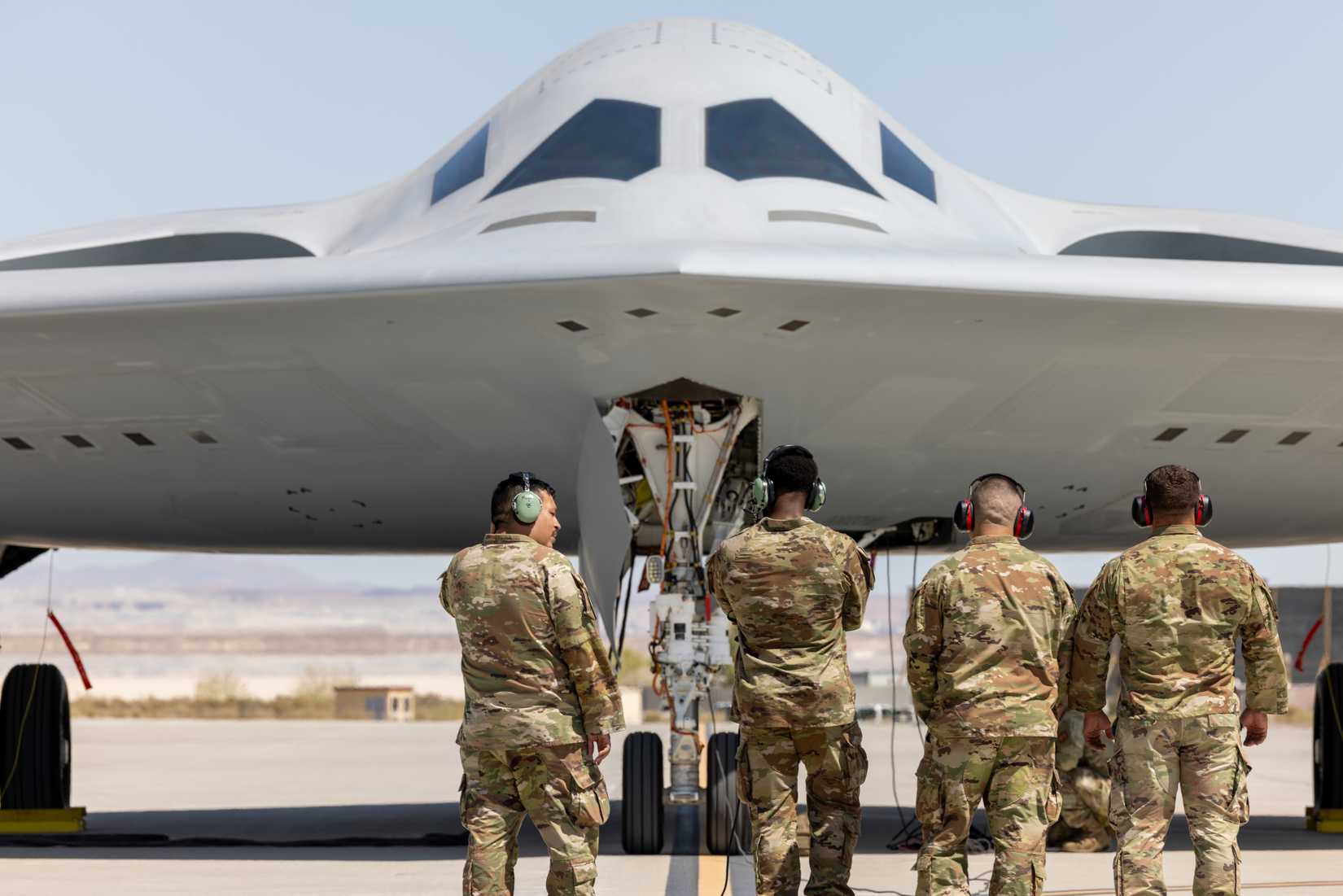 Air Force Airmen with the 912th Aircraft Maintenance Squadron prepare to recover the second B-21 Raider to arrive for test and evaluation