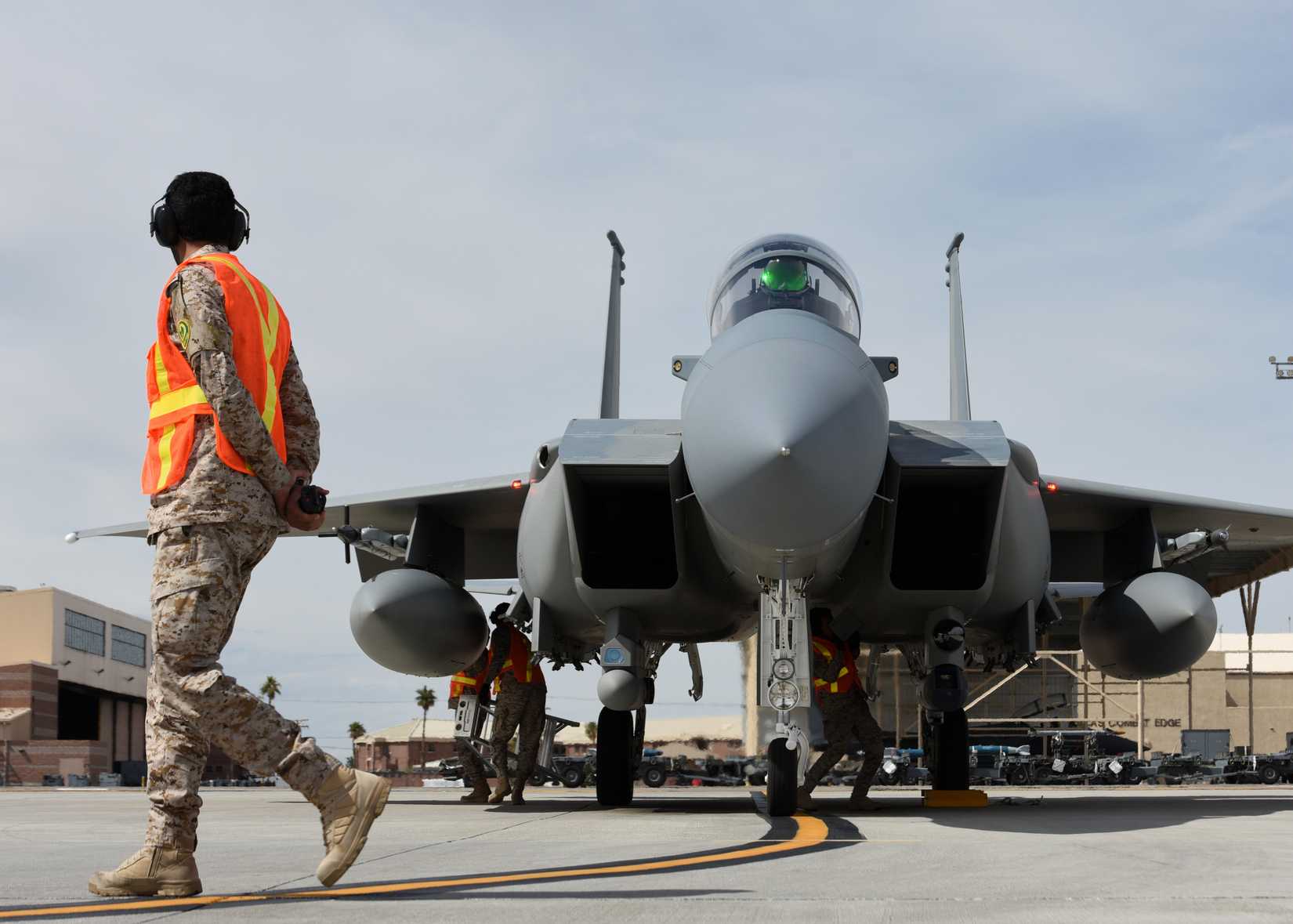 F-15SA as other Airmen prepare the plane for its mission during Red Flag 19-2 at Nellis Air Force Base, March 19, 2019