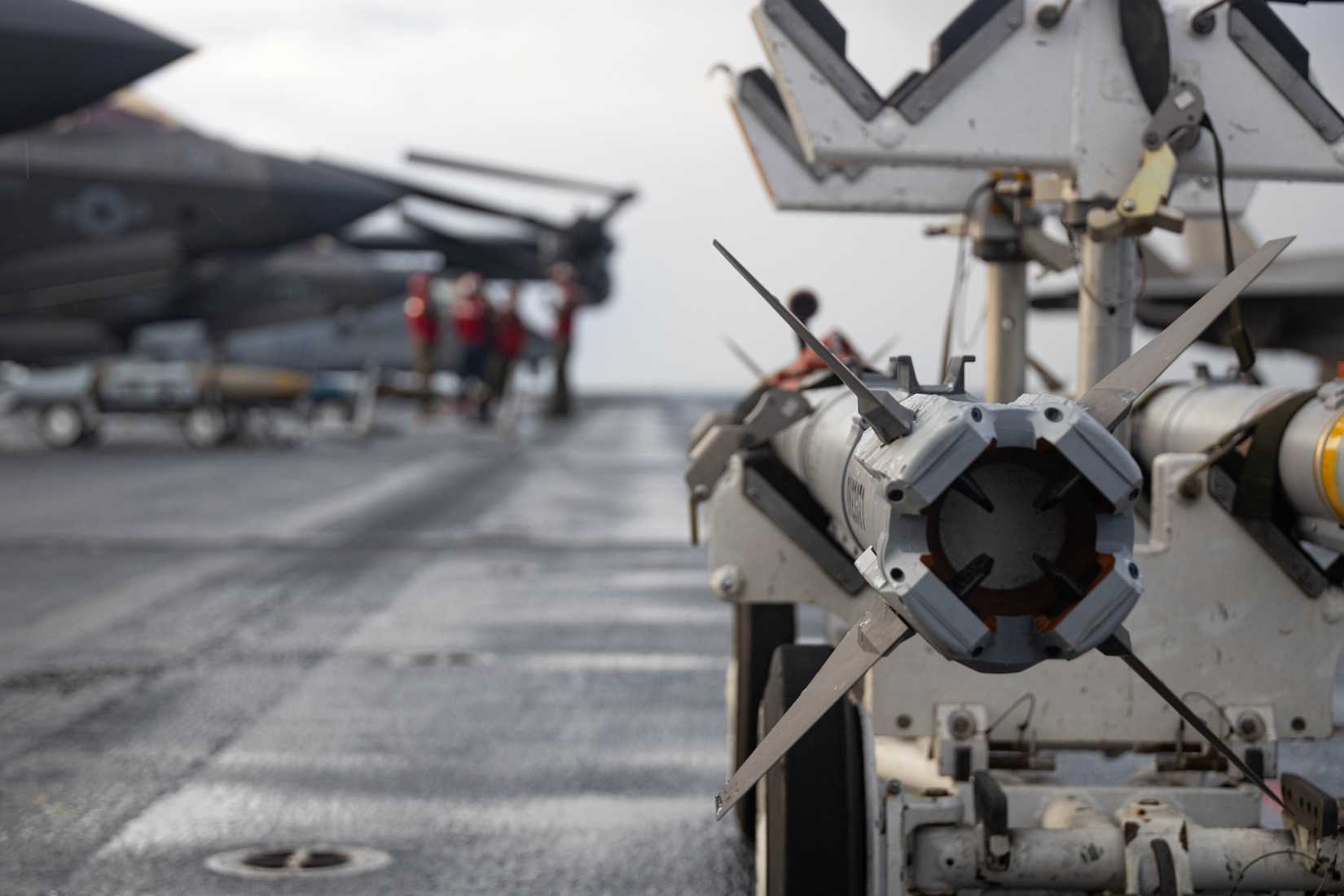 Marine Corps AIM-9X-2 missile is staged during ordnance load aboard the amphibious assault ship USS America (LHA 6)