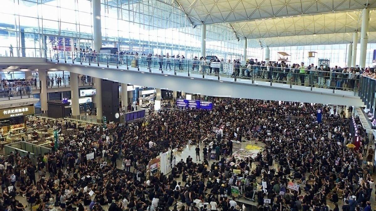 Hong Kong Airport Affected By Sit In Protest