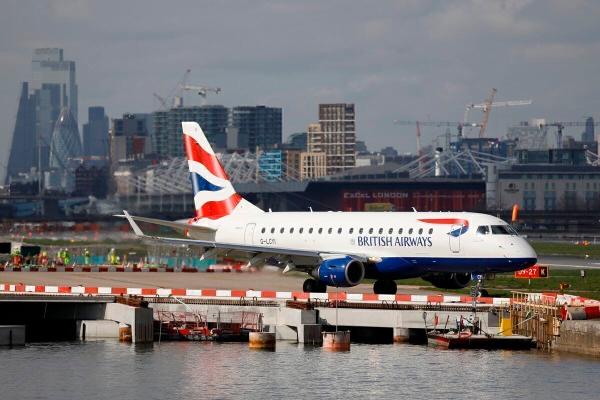 BA CityFlyer ERJ 170 at LCY: Photo by TOLGA AKMEN/AFP via Getty Images)