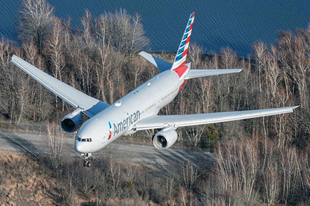 Fire Trucks Chase American Airlines 777 With Flat Tire In Tel Aviv