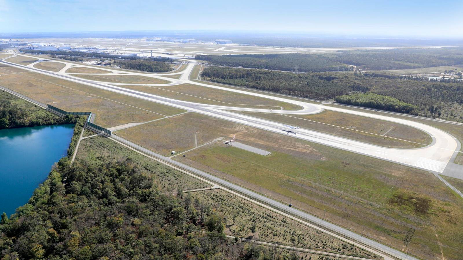 Which Airport's Runways Are Furthest From The Terminal?