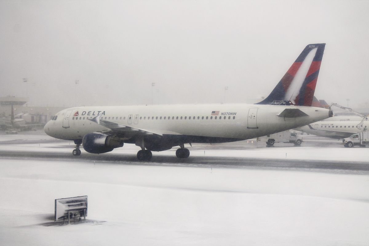 US Flight Cancellations Continue As Weather And Omicron Take A Toll