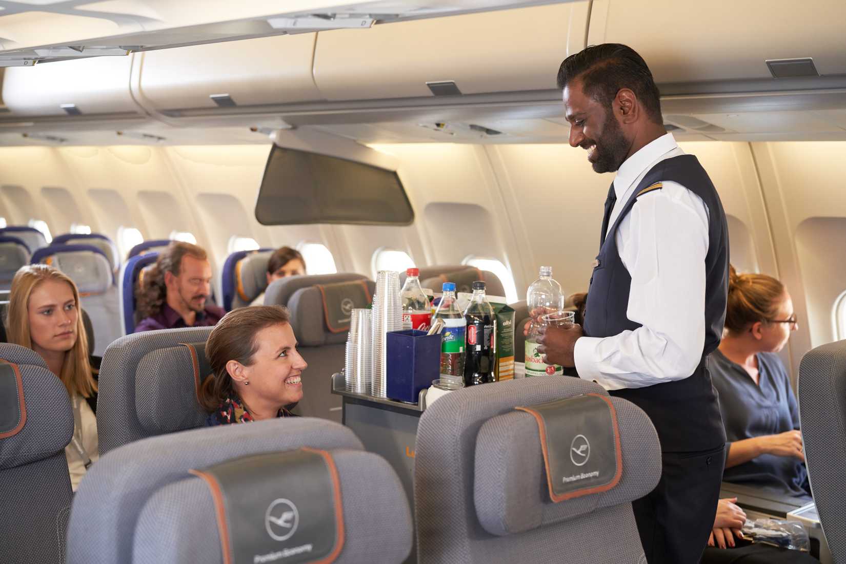Lufthansa Crew with passengers in cabin