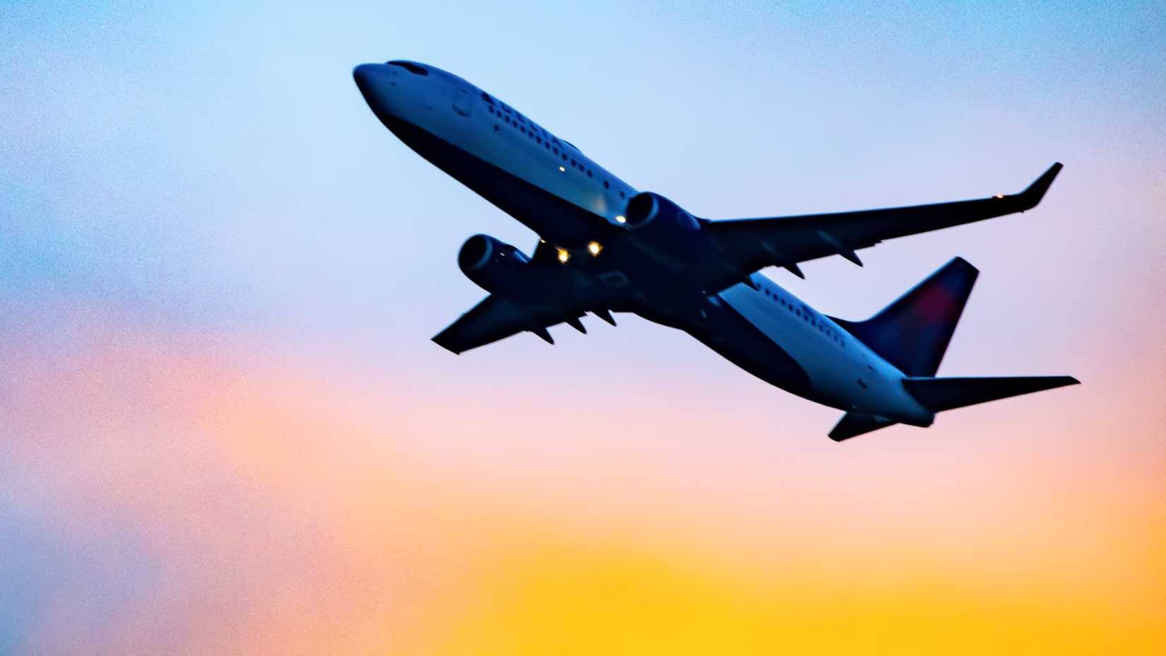 A Rising Boeing Boeing 737-832(WL) of Delta Air Lines From the Sea-Tac Sunset