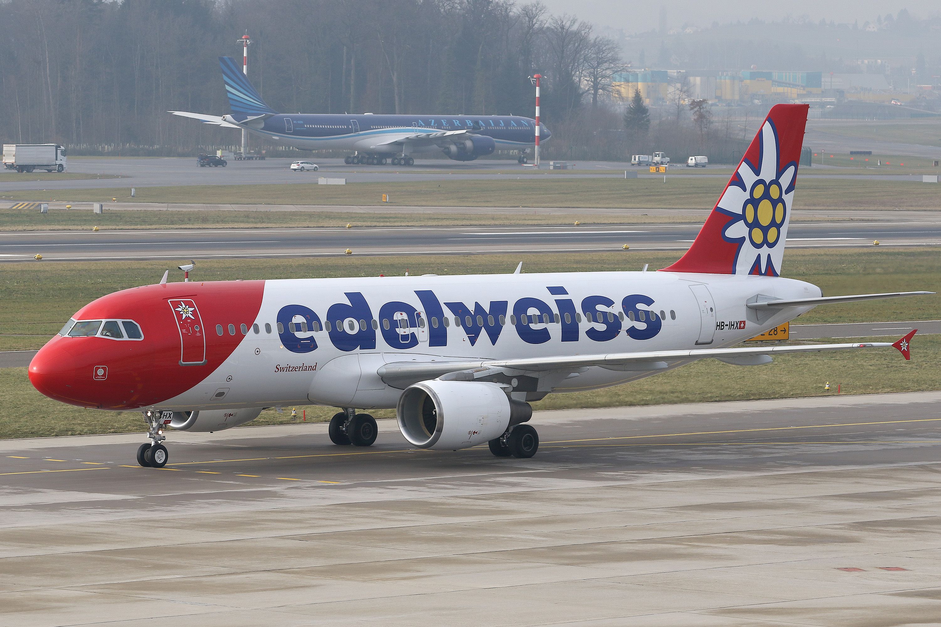 Video: Edelweiss Air Pilot Helps Ground Staff Load Bags Amid UK Airport Chaos