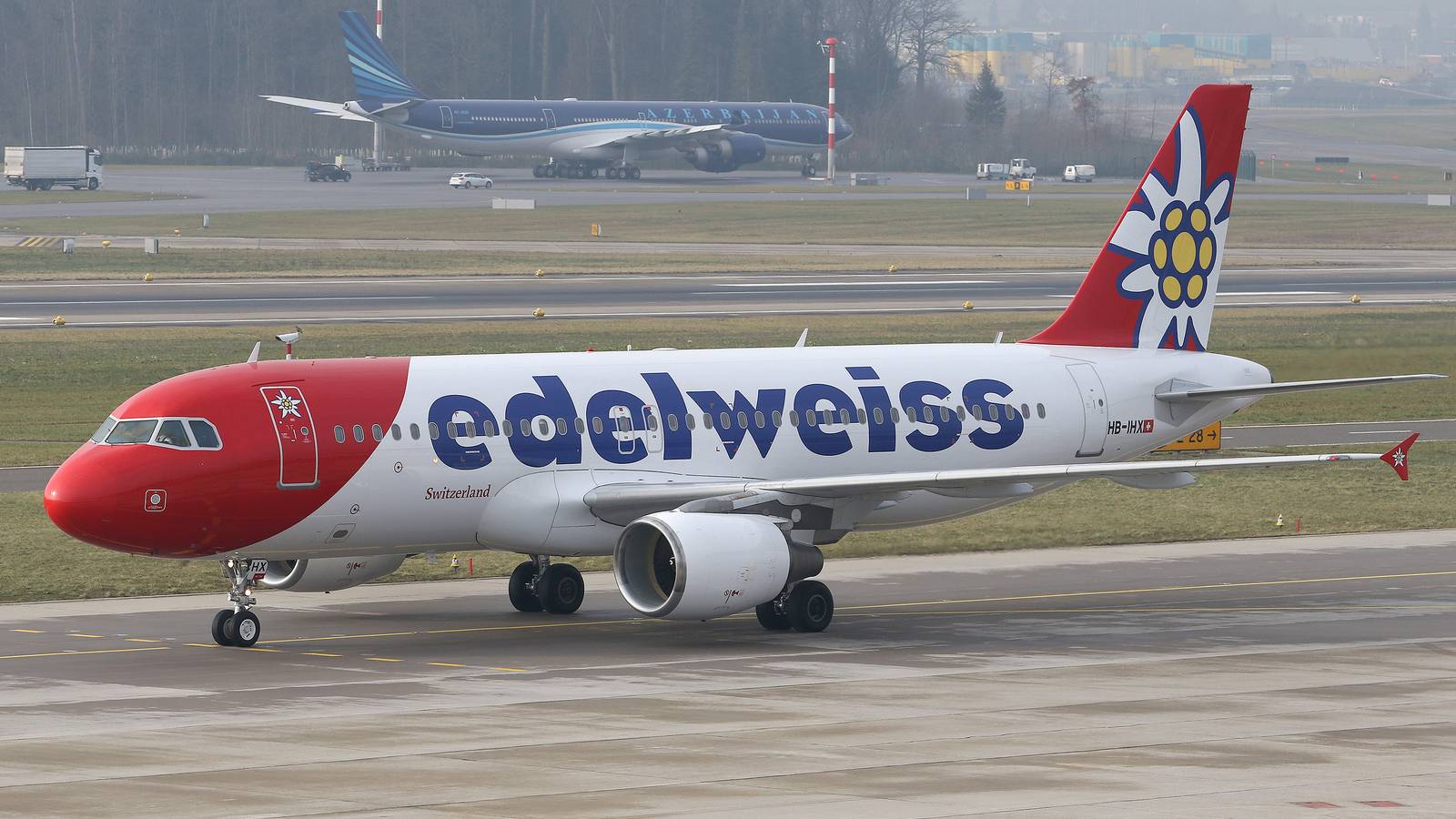 Video: Edelweiss Air Pilot Helps Ground Staff Load Bags Amid UK Airport Chaos