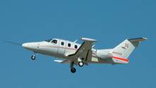 An Eclipse aircraft flying in the sky.