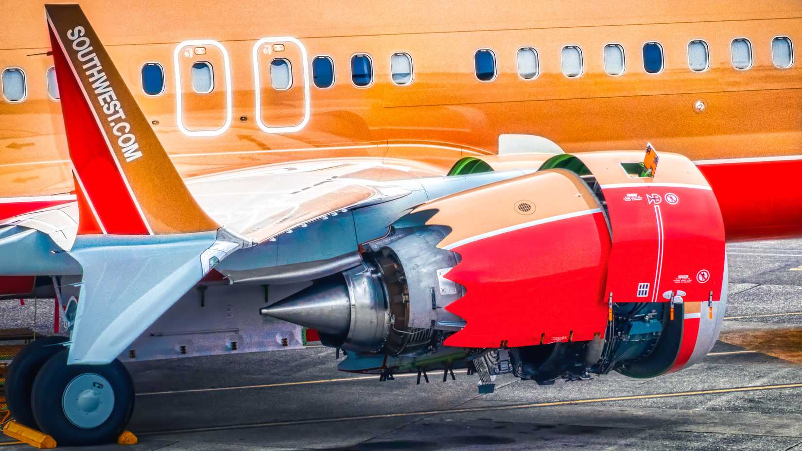Zoom on the Southwest HK Tribute Winglet and Engine - 737 MAX 8 with a CFM International LEAP-1B engine lacking cowling