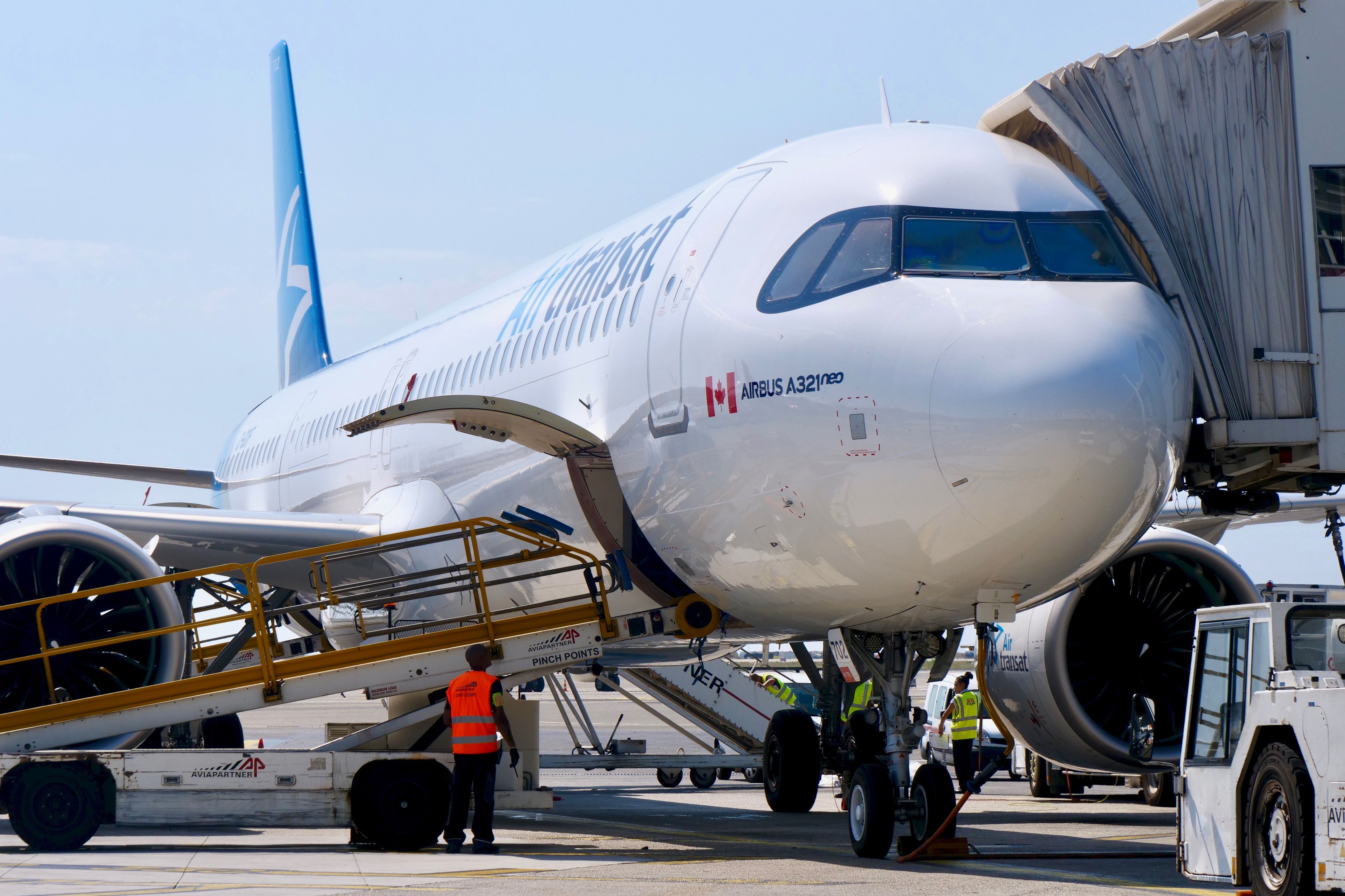 Aircraft Tug Gets Stuck Under Air Transat Airbus A321neo