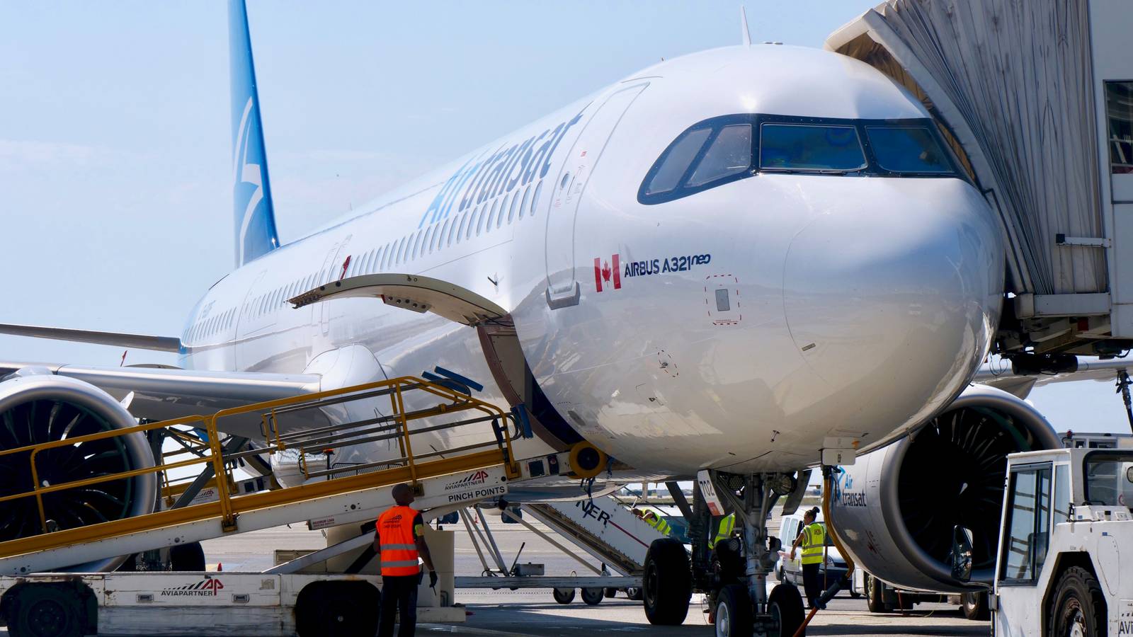Aircraft Tug Gets Stuck Under Air Transat Airbus A321neo