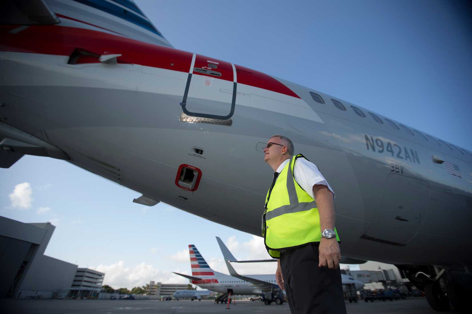 Pilots-conducting-aircraft-walk-around - American Airlines