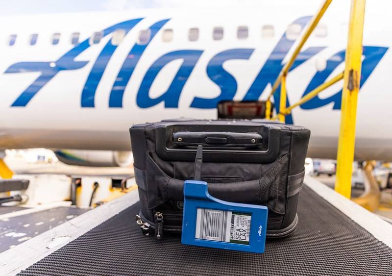 Why Alaska Airlines Doesn't Want Your Checked Bag To Be Late