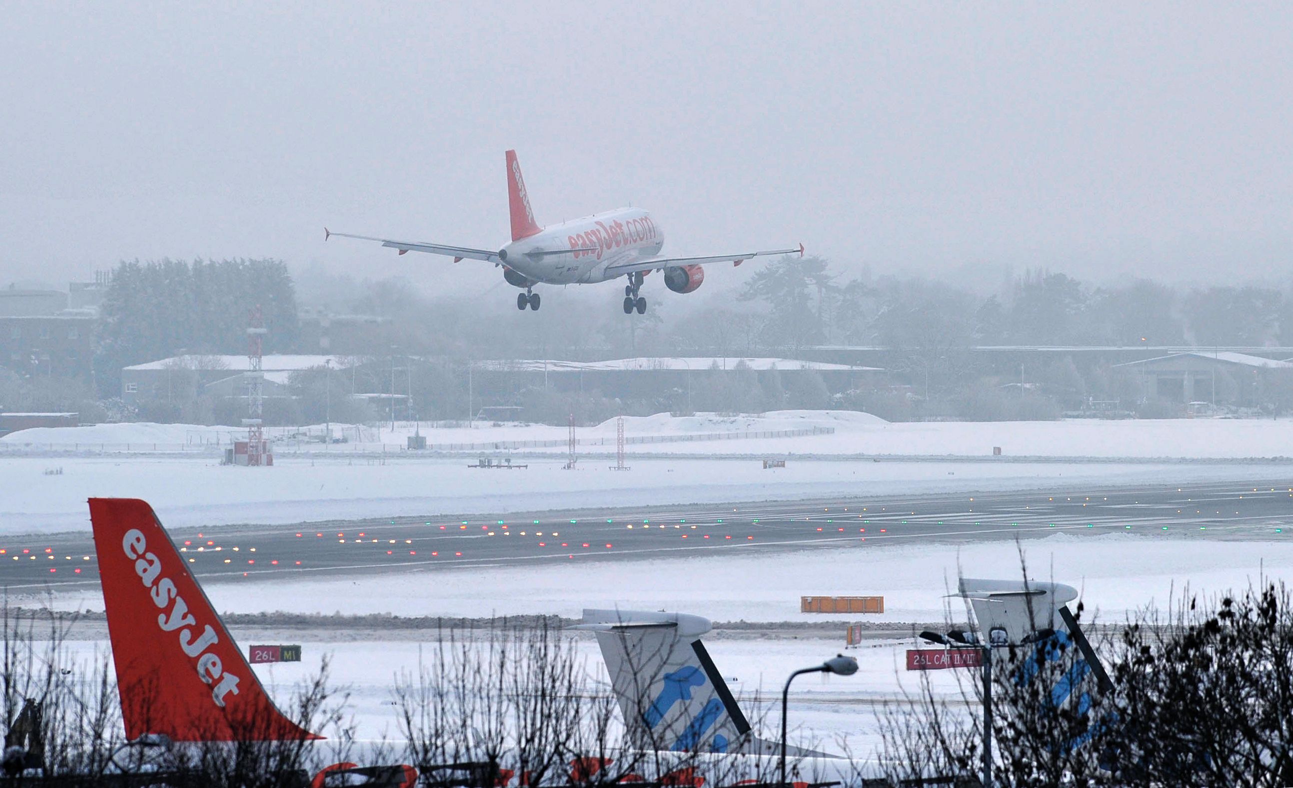 London's Airports Suffer Significant Delays & Cancellations Amid Snow