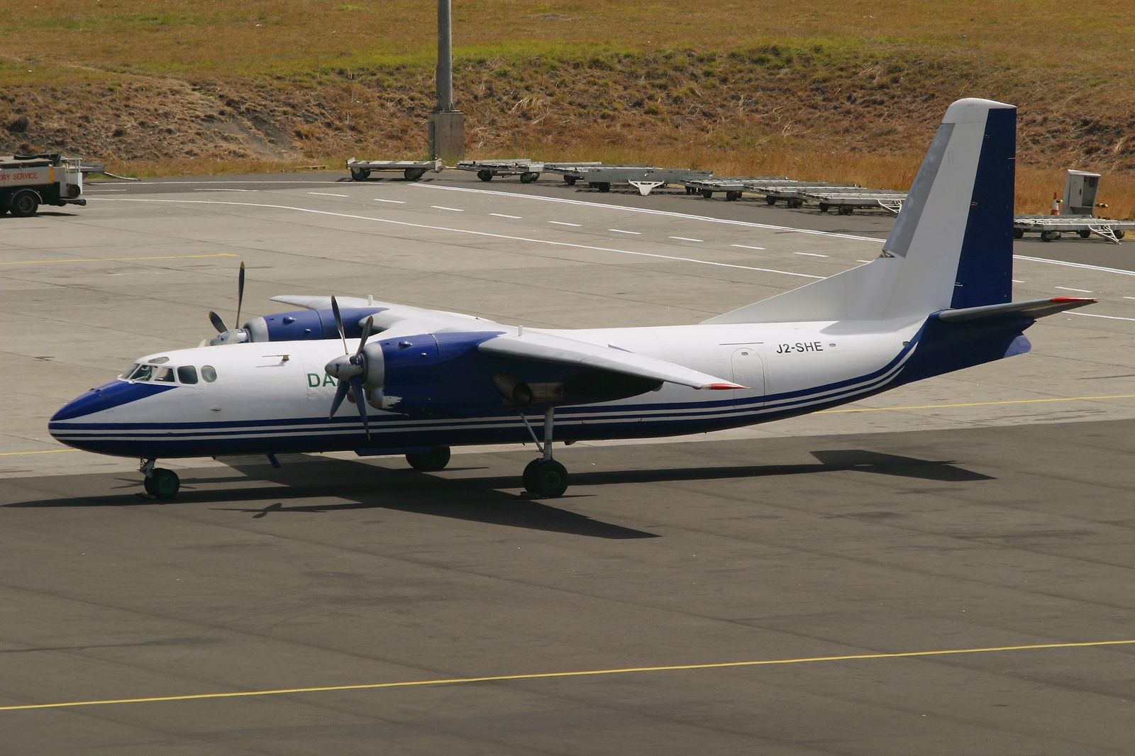 A Daallo Airlines Antonov An-24RV parked on Addis Ababa's airport apron.