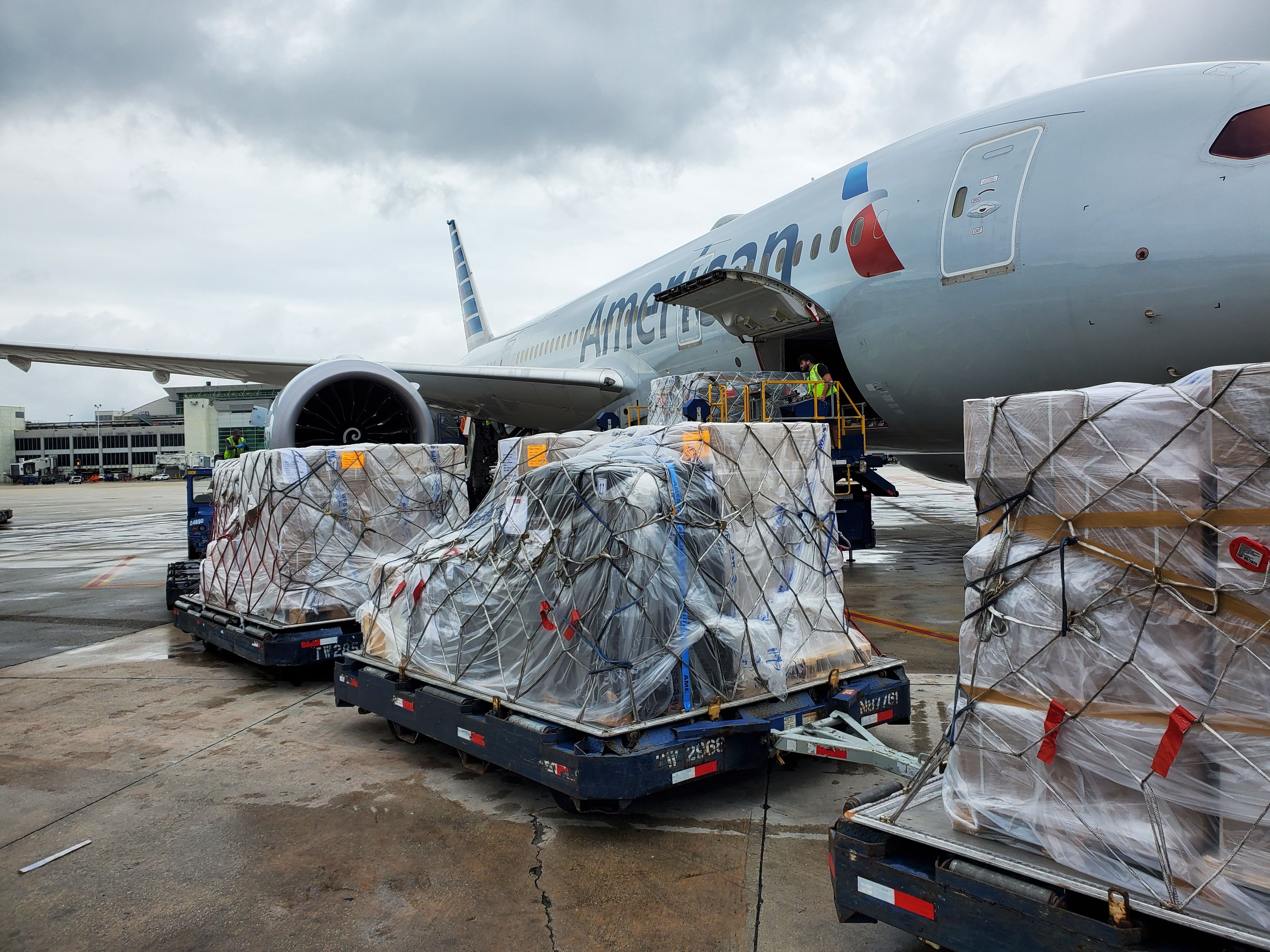 Cargo being loaded into an American Airlines aircraft.