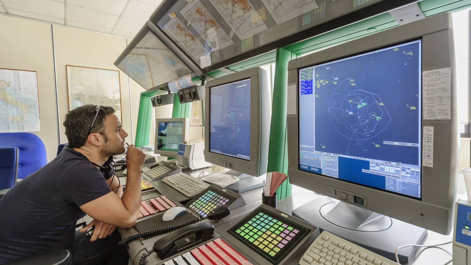 Sharing Airspace Between Future Air Taxis & Current Airliners: The Challenges & Solutions