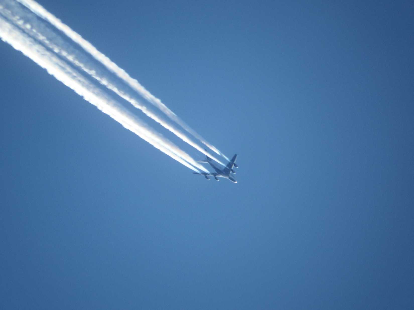 Planes and contrails - A380 making contrails in the blue yonder