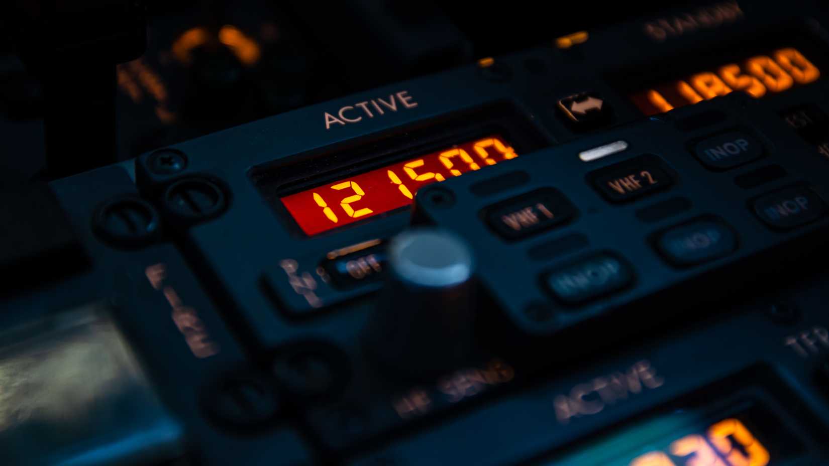 Guard frequency, 121.5, on a radio selector panel.