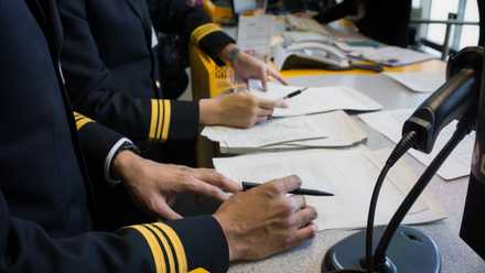 Pilots at their preflight briefing.