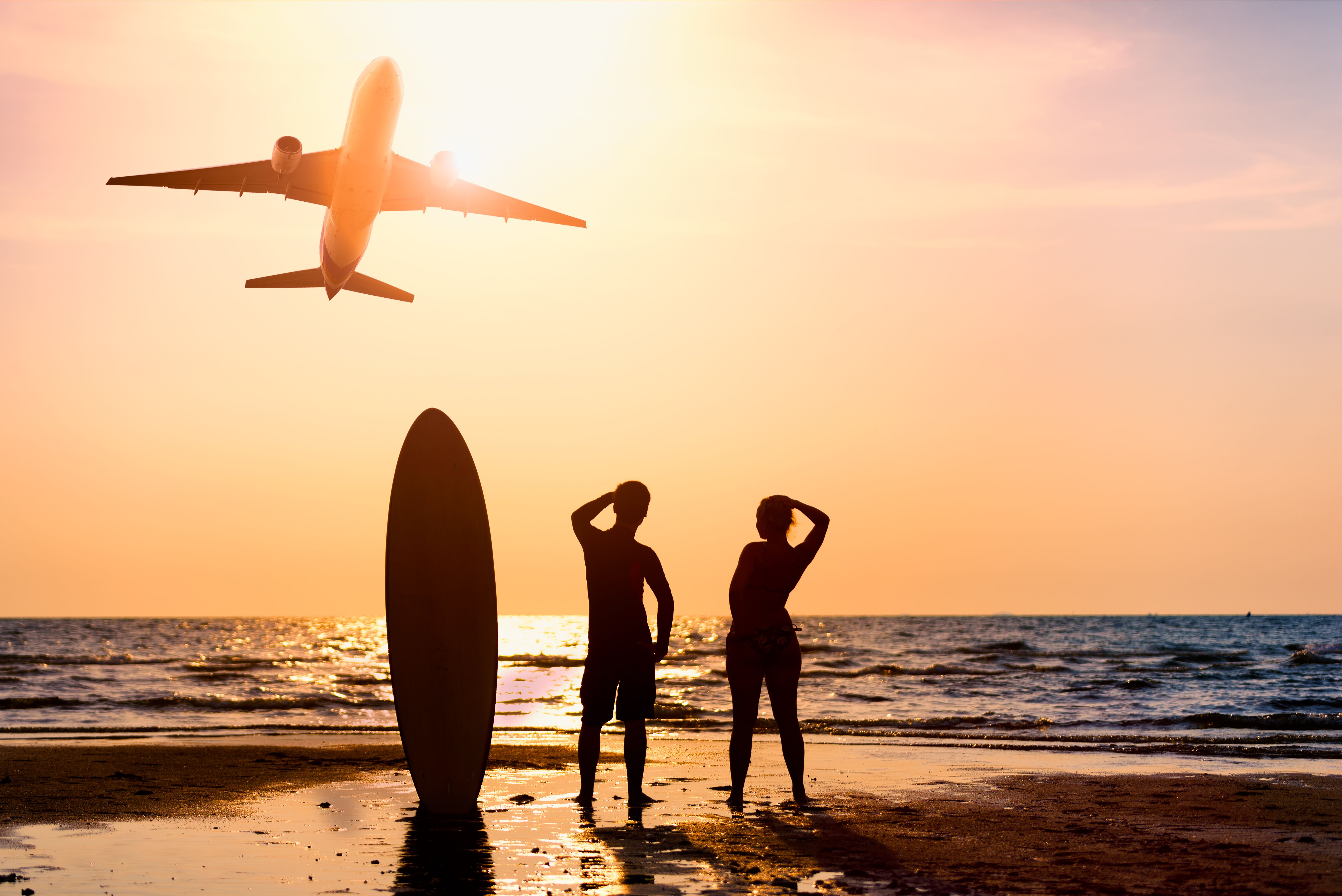 The Ins & Outs Of Taking Surfboards On Planes