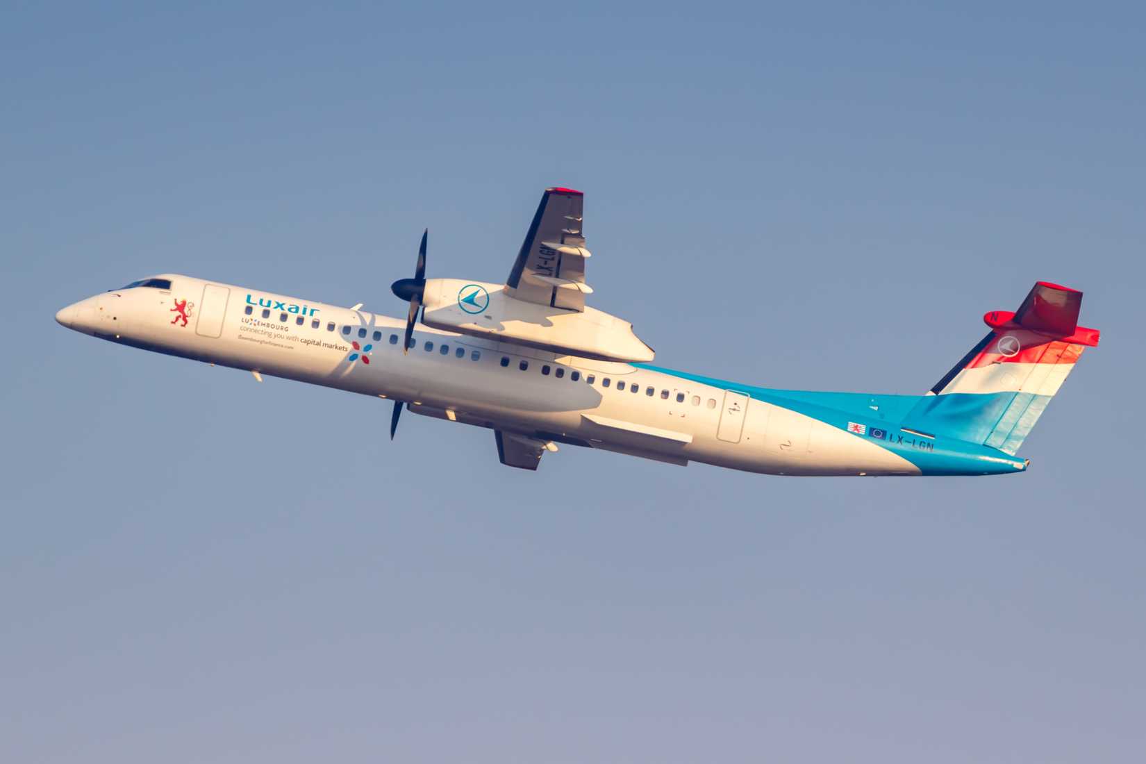 A Luxair Q400 Flying in the sky.