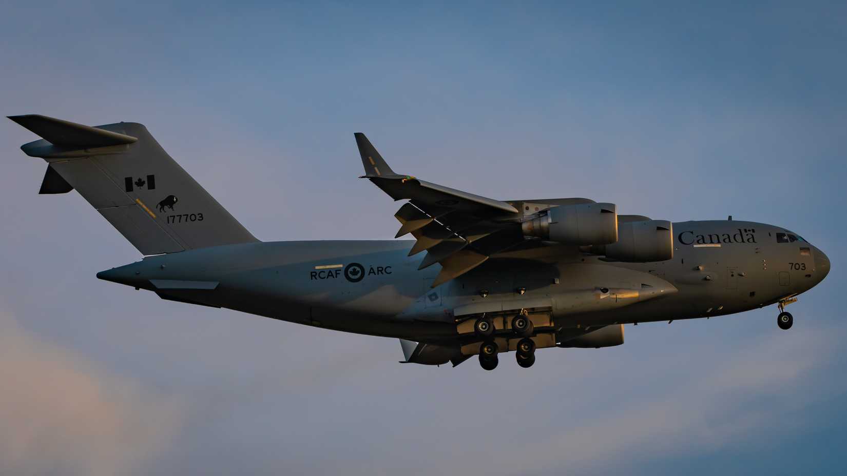 An RCAF CC-177 Making A Low Speed Pass at dusk.
