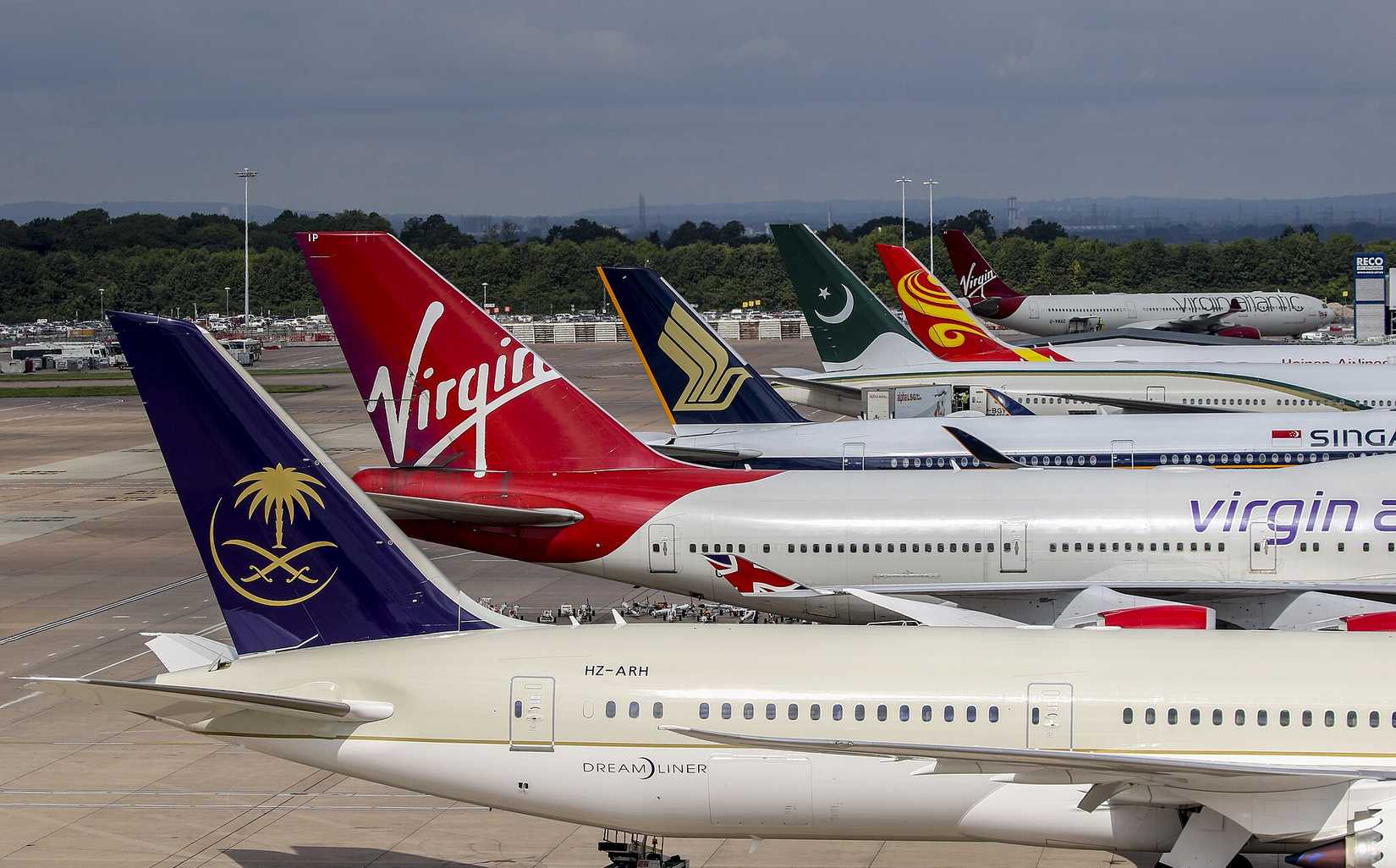 Line up of wide-body airliners at Terminal 2 of Manchester Airport