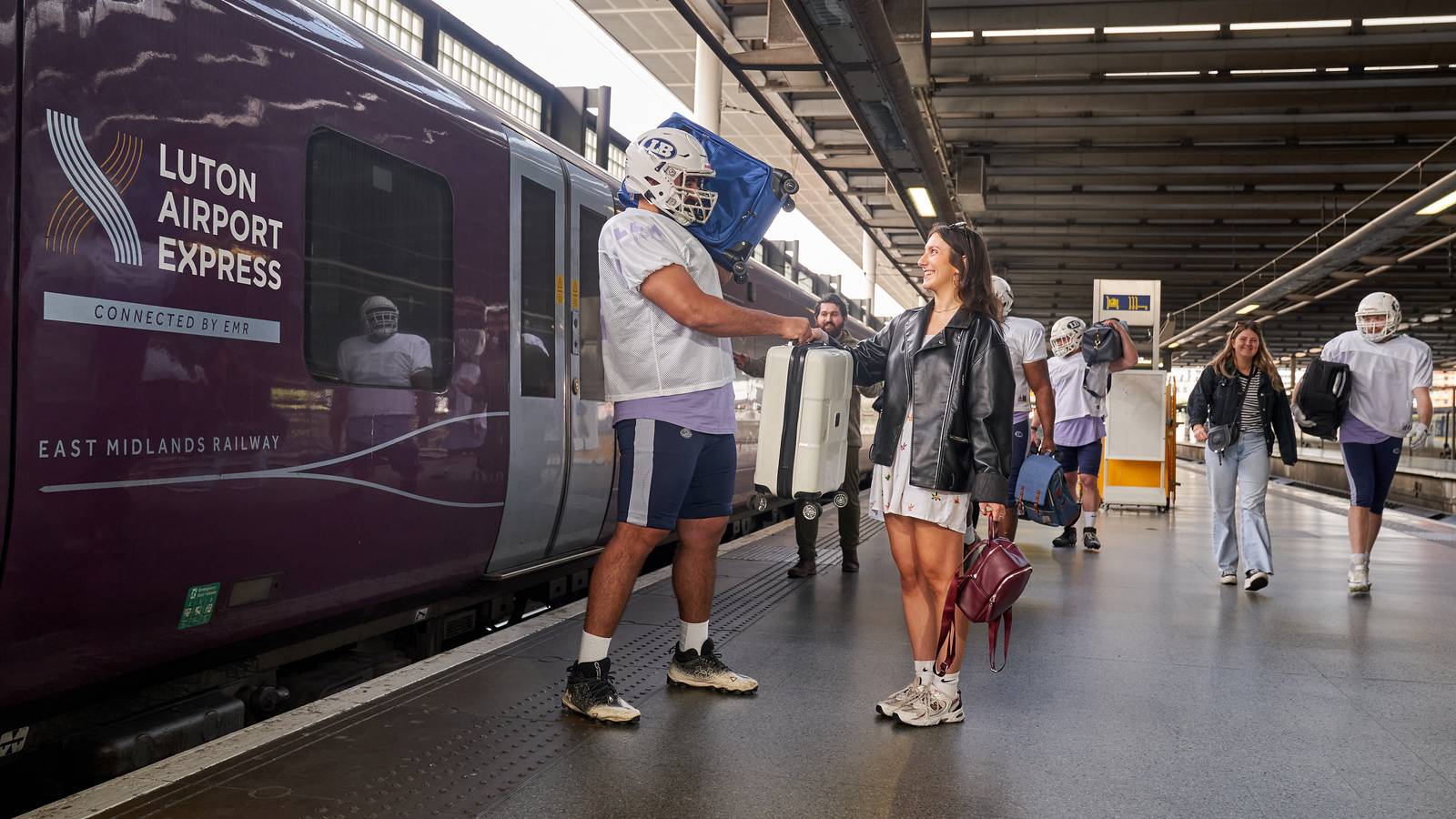 London Luton Airport Showcases Stress Free Travel With Football Players Carrying Luggage