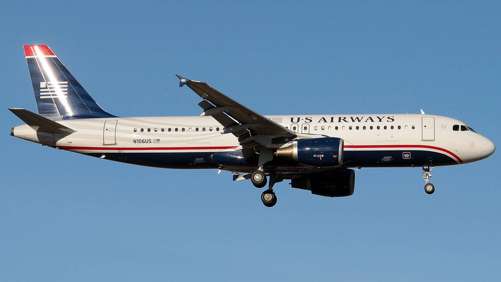 A US Airways Airbus A320 Flying in the sky.
