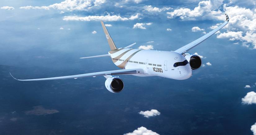 An ACJ350-900 flying in the sky.