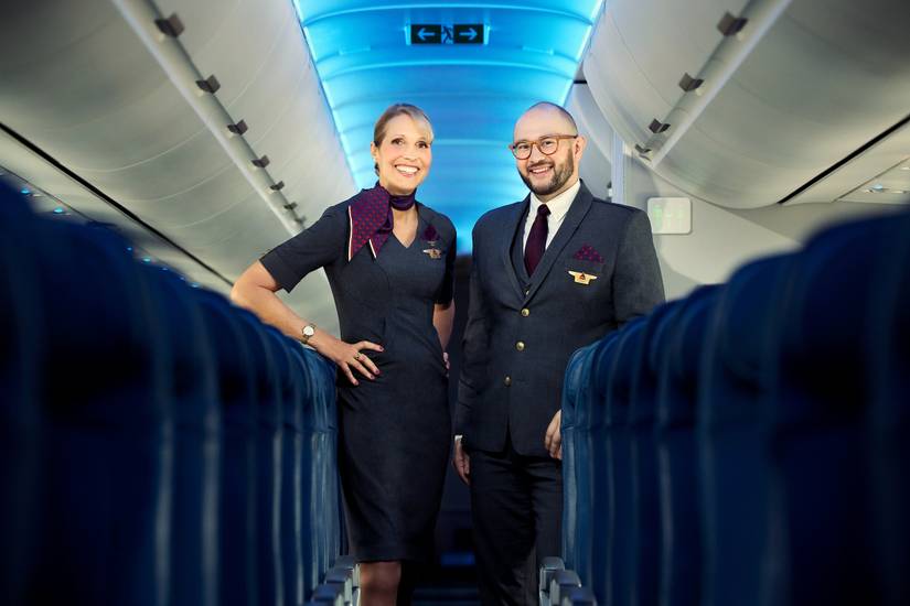 Photo of middle aged female and male Delta Air Lines cabin crew