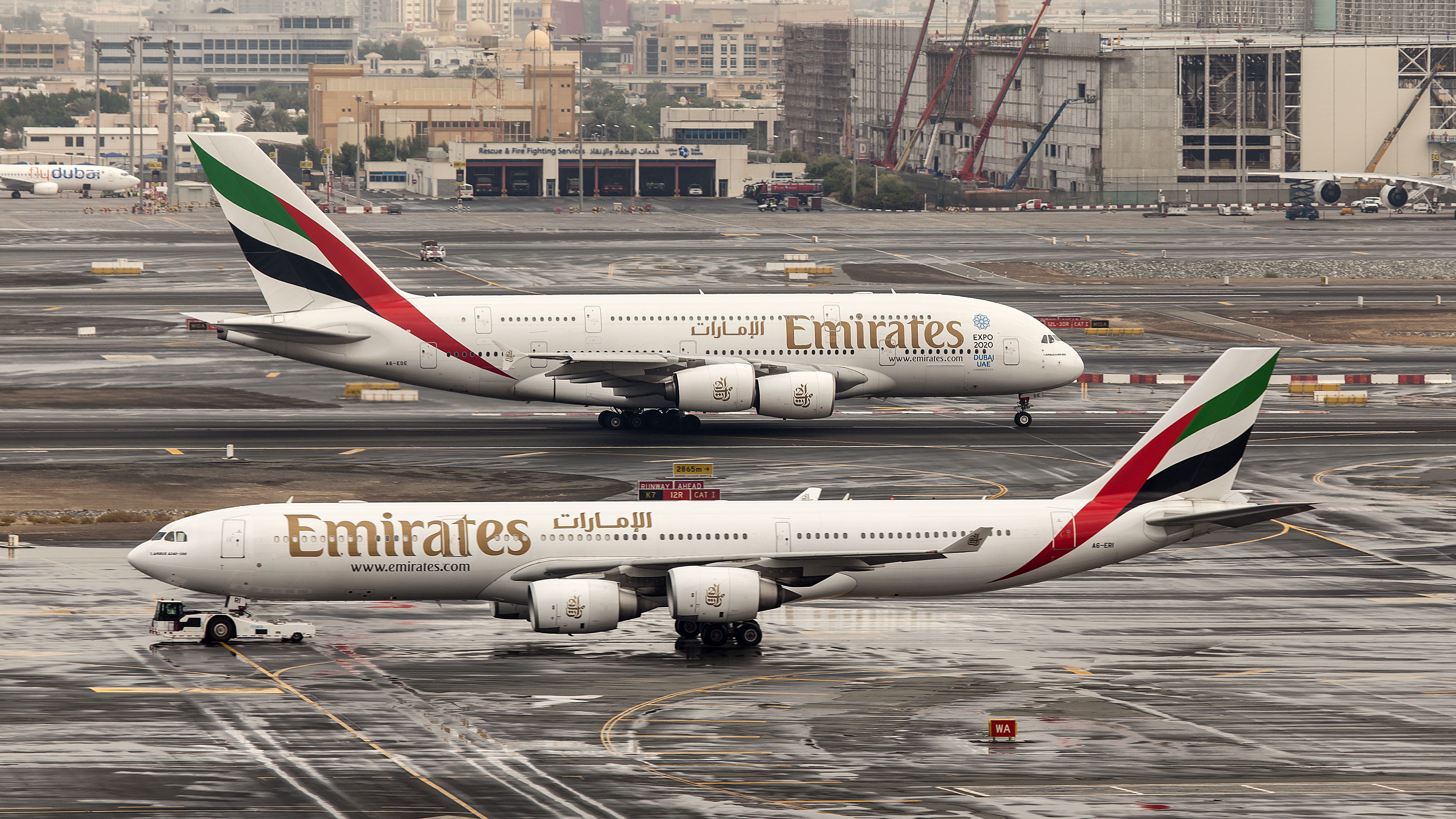 Emirates A340 and A380 on tarmac