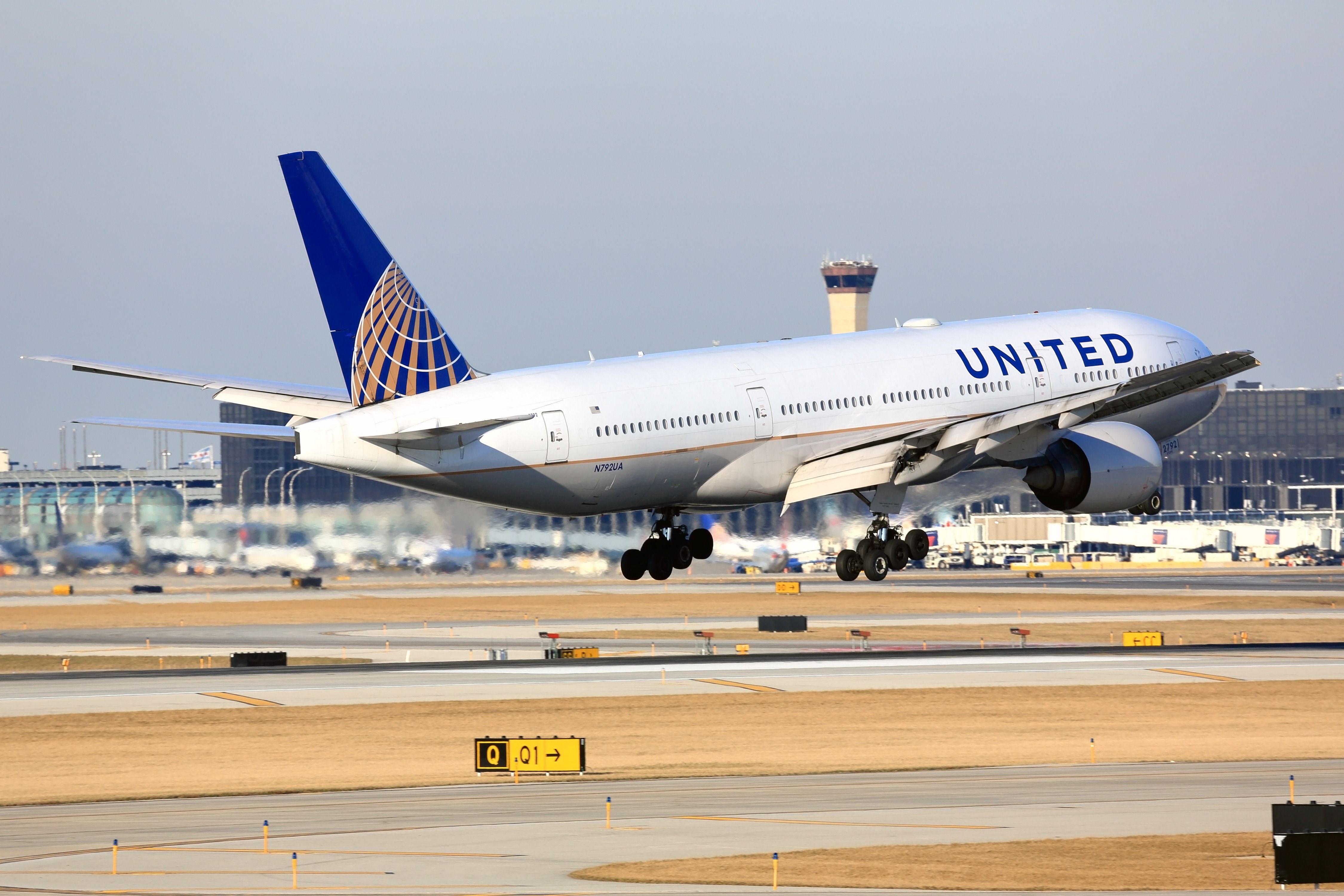 Chicago, Illinois, USA - March 19, 2017: United Airlines Boeing 777-200 passenger jet airliner arriving for a landing at O'Hare International Airport in Chicago, Illinois, USA.