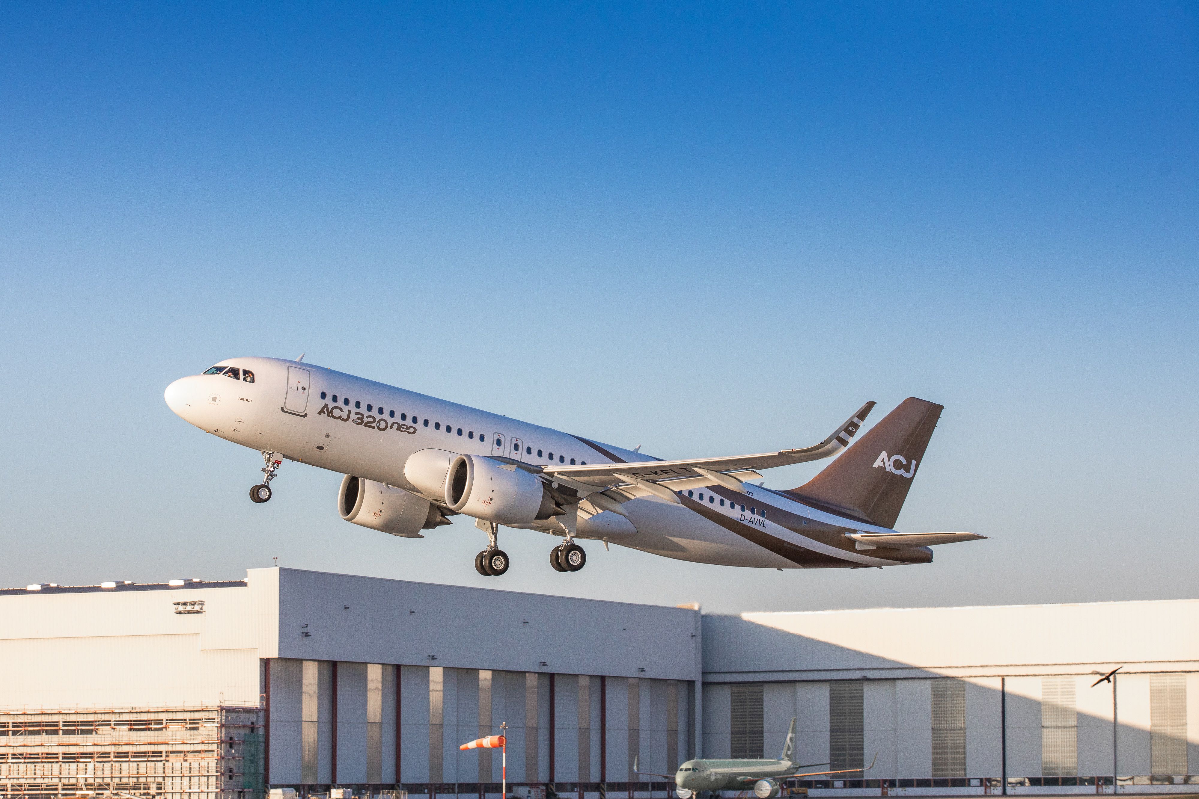 An Airbus corporate jet just after take off.