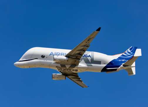 An Airbus BelugaXL flying in the sky.