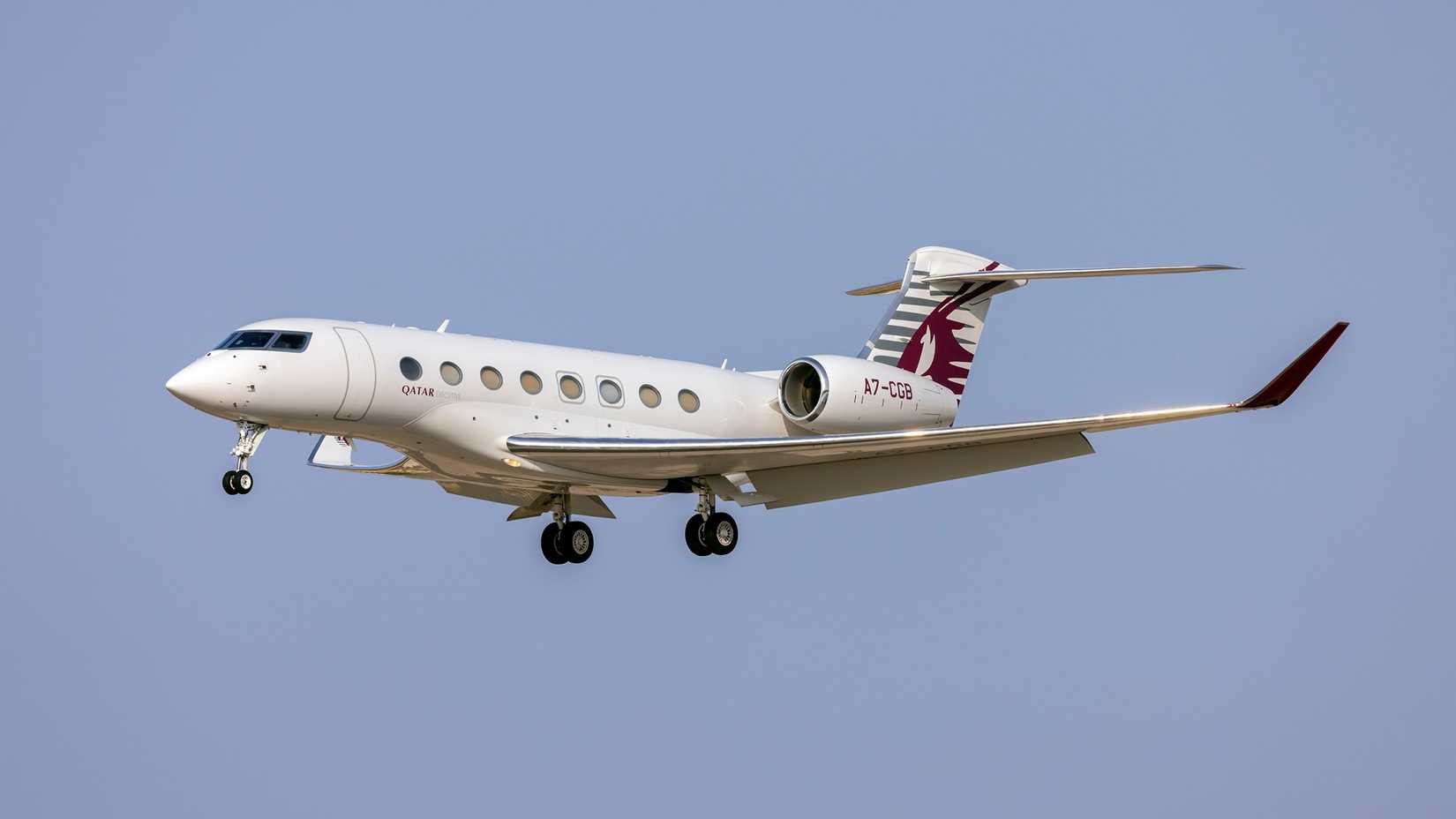 A Qatar Executive Gulfstream G650ER flying in the sky.