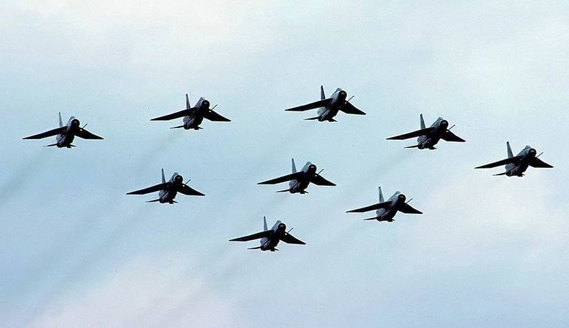 Several RAF English Electric Lightning F6 Aircraft flying in formation.