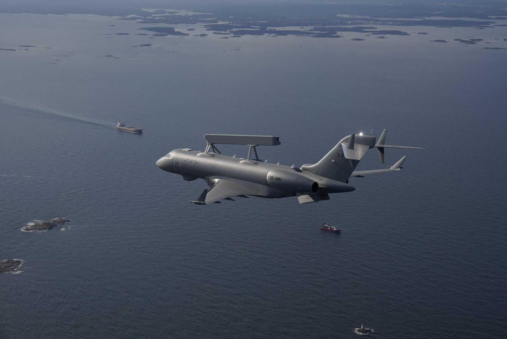A Saab Globaleye flying over an ocean.