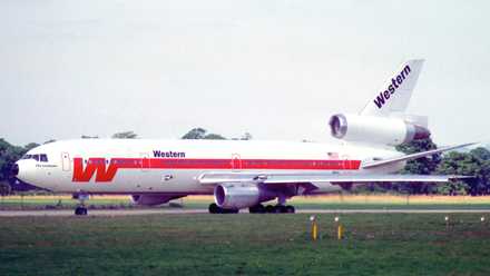 A Western Airlines DC-10-30 on an airport apron.
