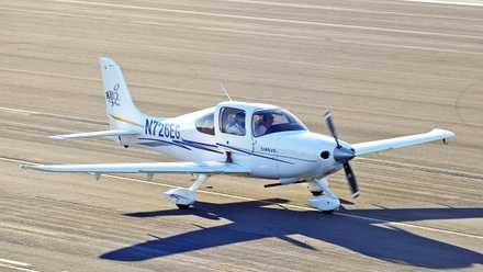 A Cirrus SR20 on a runway.