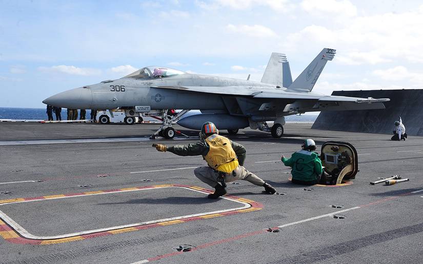 A USAF F-18 about to take off from an aircraft carrier