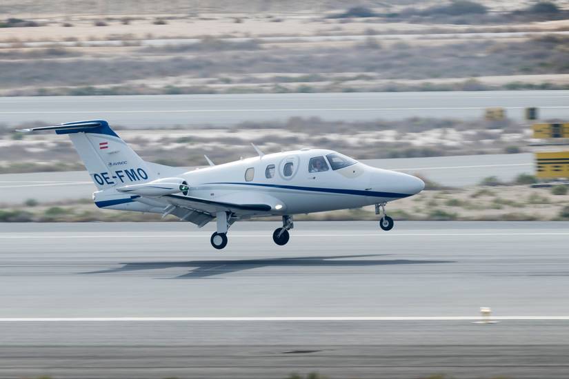 A Mali Air Eclipse 550 about to land on a runway.