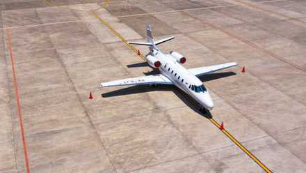 A Cessna 560 XLS parked on an airport apron.