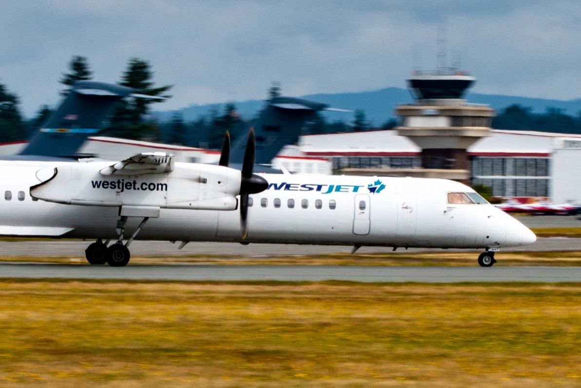 Alarm From Cell Phone Prompted WestJet Dash 8 Aborted Takeoff