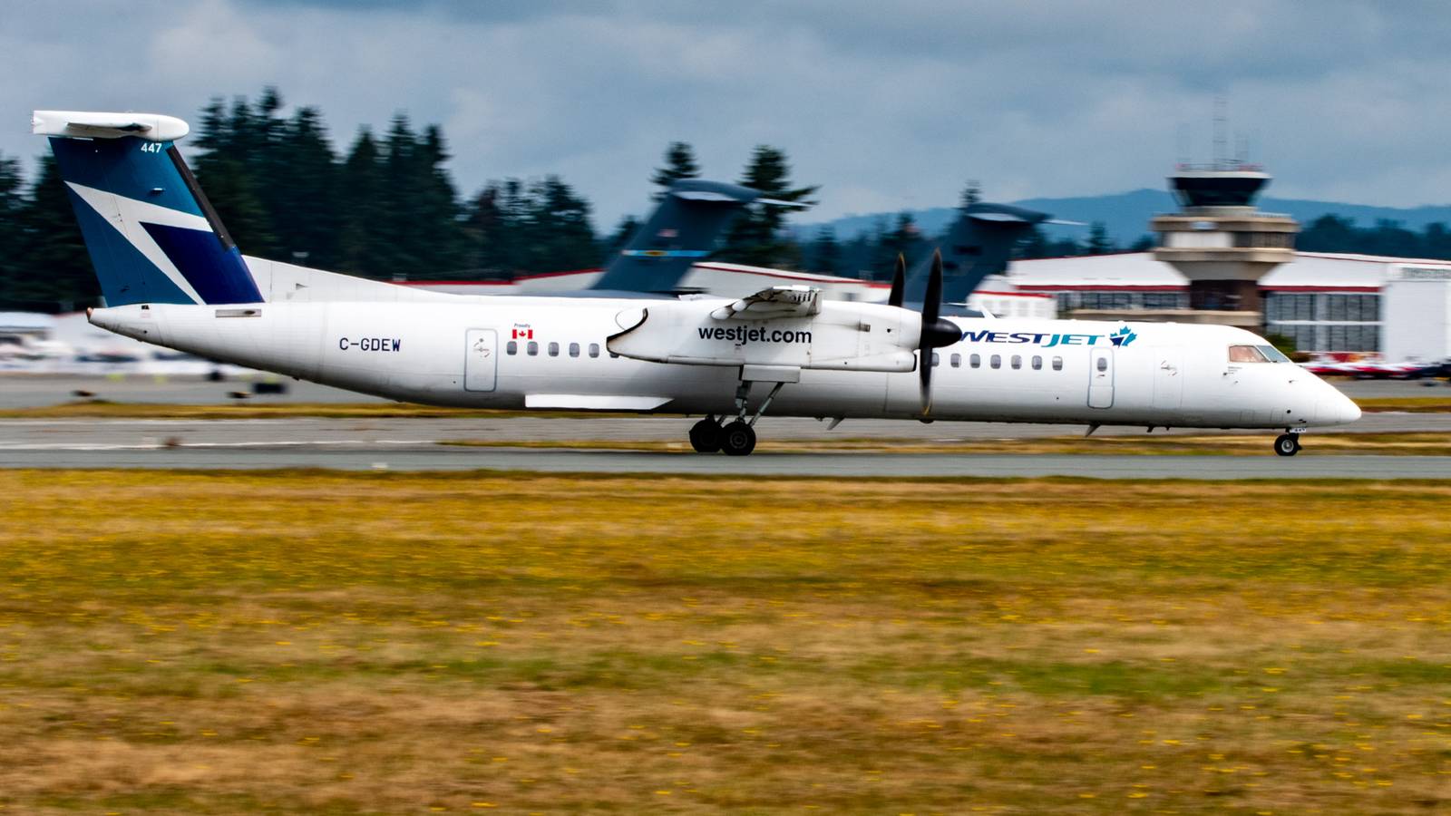 Alarm From Cell Phone Prompted WestJet Dash 8 Aborted Takeoff