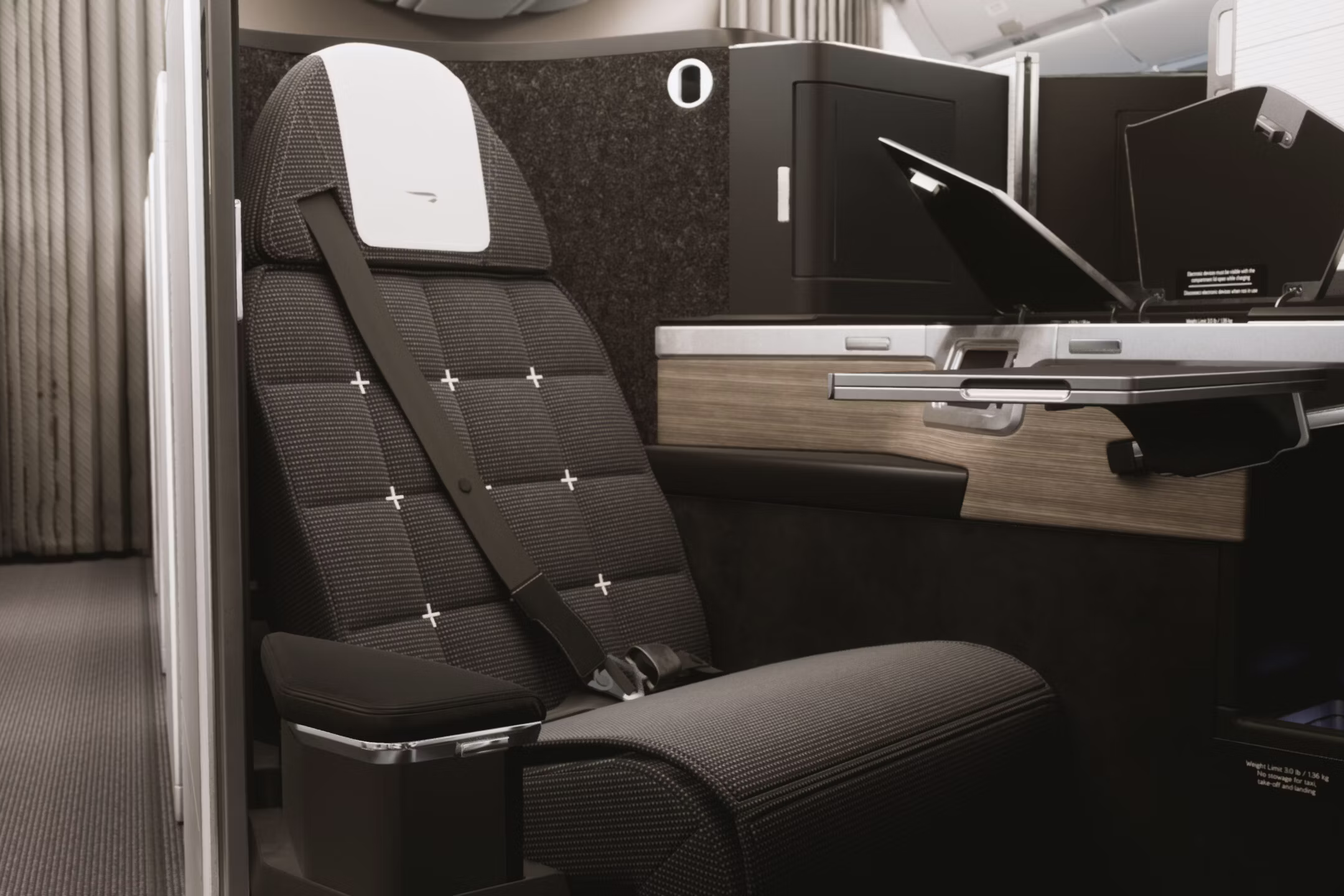 Why Some Business Class Seats Have 3-Point Seatbelts