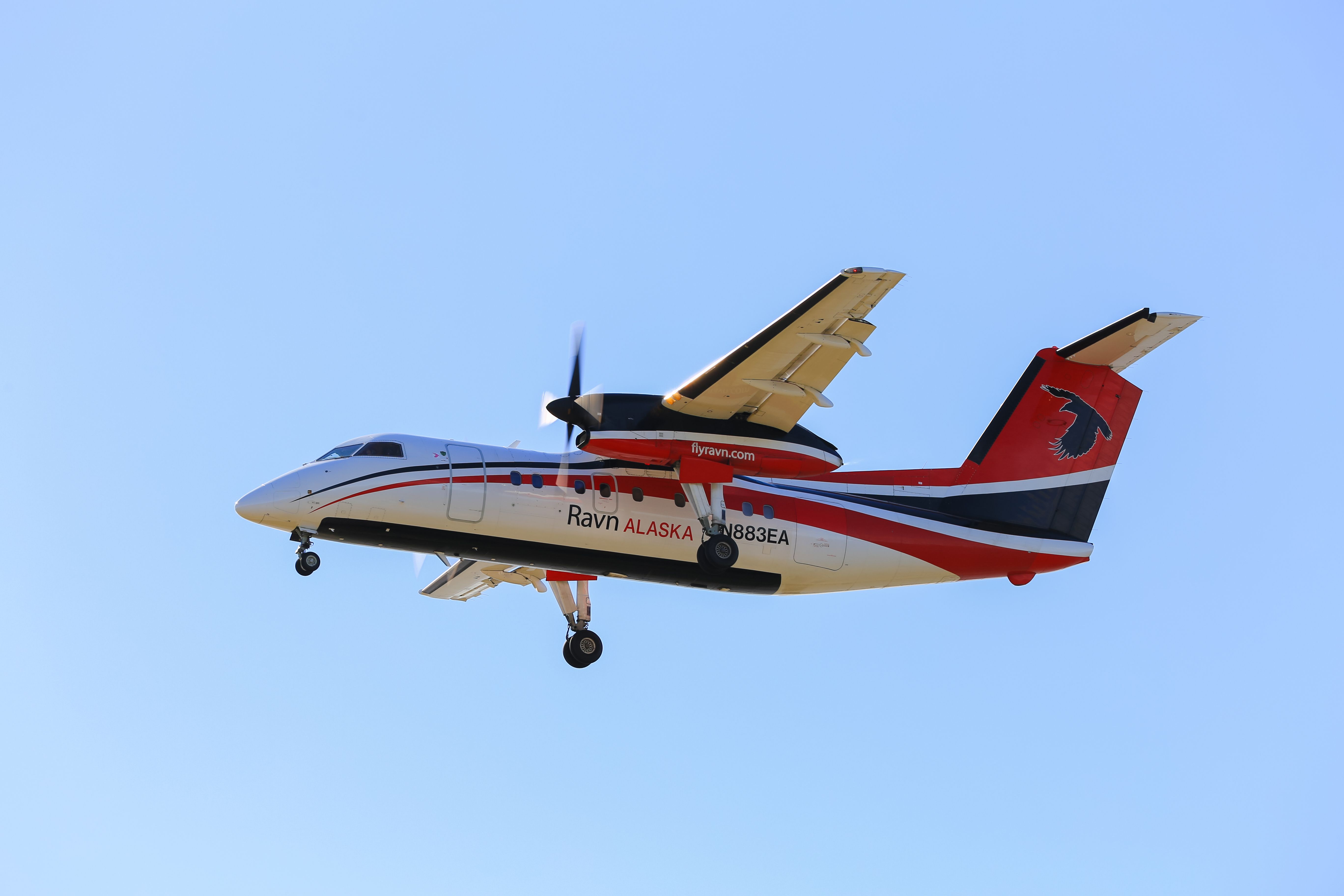 Ravn Alaska DHC-8-100 landing at Ted Stevens International Airport ANC shutterstock_670521511