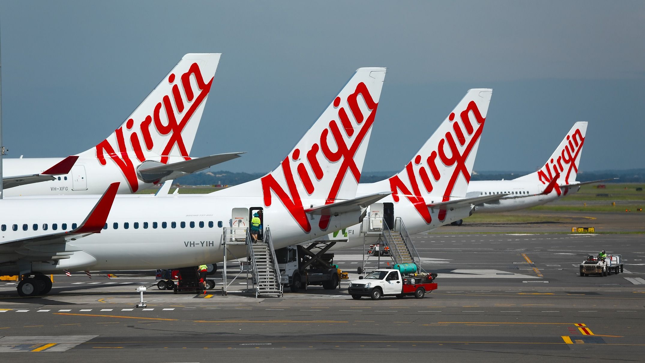 Virgin Australia aircraft parked at Sydney Airport SYD shutterstock_192358655